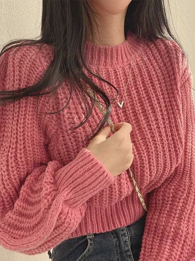 Pink chunky knit sweater for women with cozy texture and full sleeves, stylish winter wear