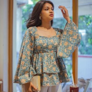 Blue floral peplum kurti top for women with bell sleeves and layered design, stylish ethnic wear