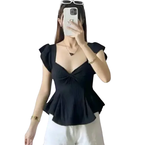 woman wearing black ruched peplum top with cap sleeves paired with white pants stylish korean fashion outfit