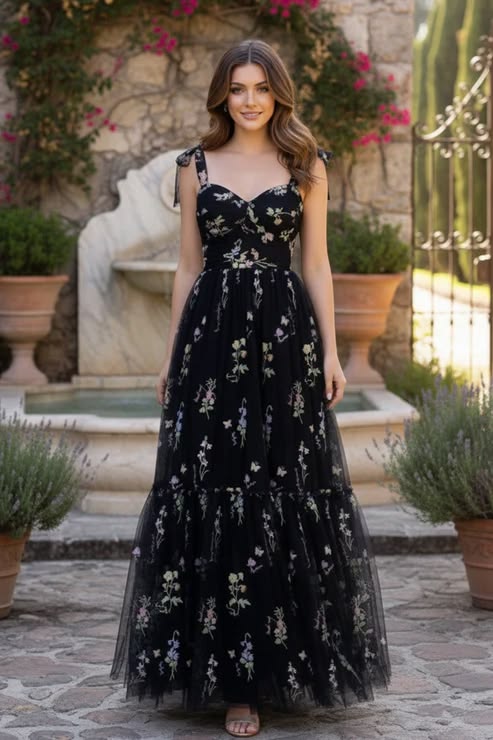 Black floral embroidered evening gown for women with flowy silhouette and elegant party wear design